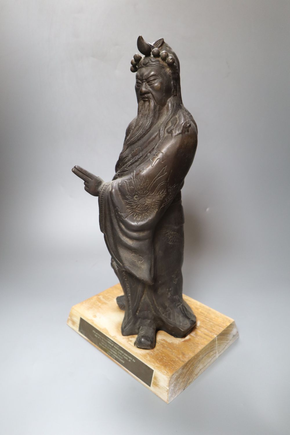 A Chinese bronze figure of Guandi, 42cm
